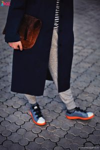 raf simons sneakers and leather clutch